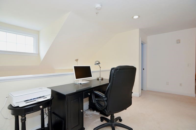 61 Providence Road, Unit 2 Grafton, MA 01519 - Photo 25 of 35 a view of a workspace with furniture