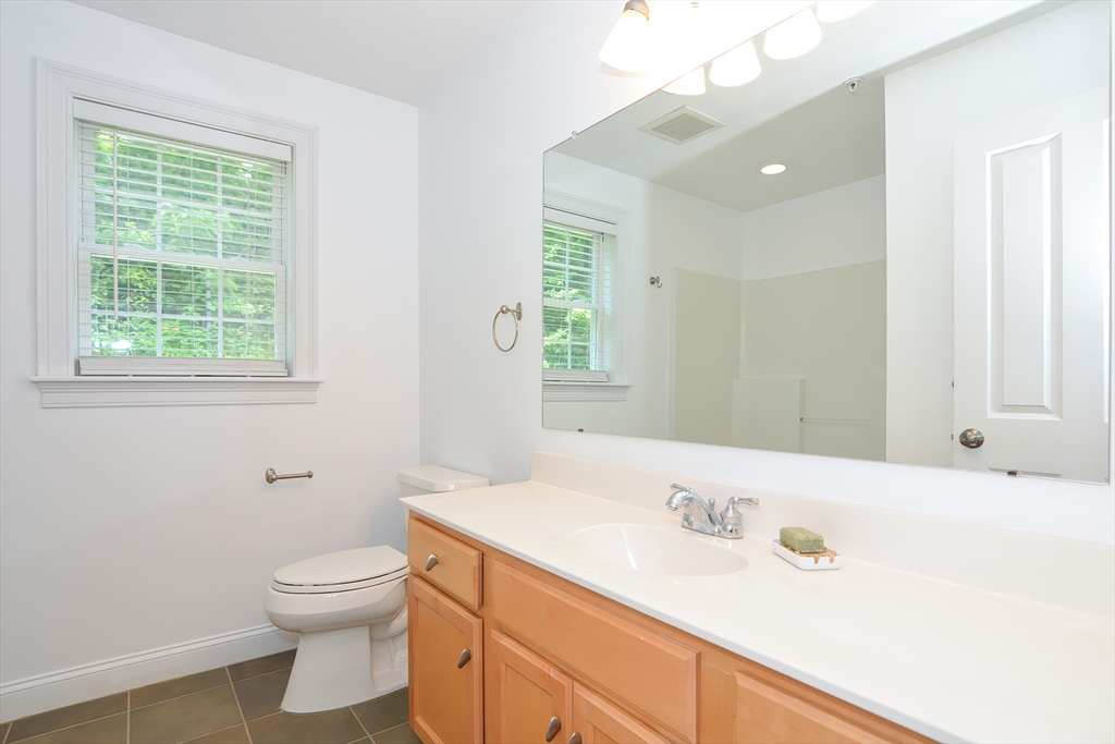 61 Providence Road, Unit 2 Grafton, MA 01519 - Photo 30 of 35 a bathroom with a sink and a toilet