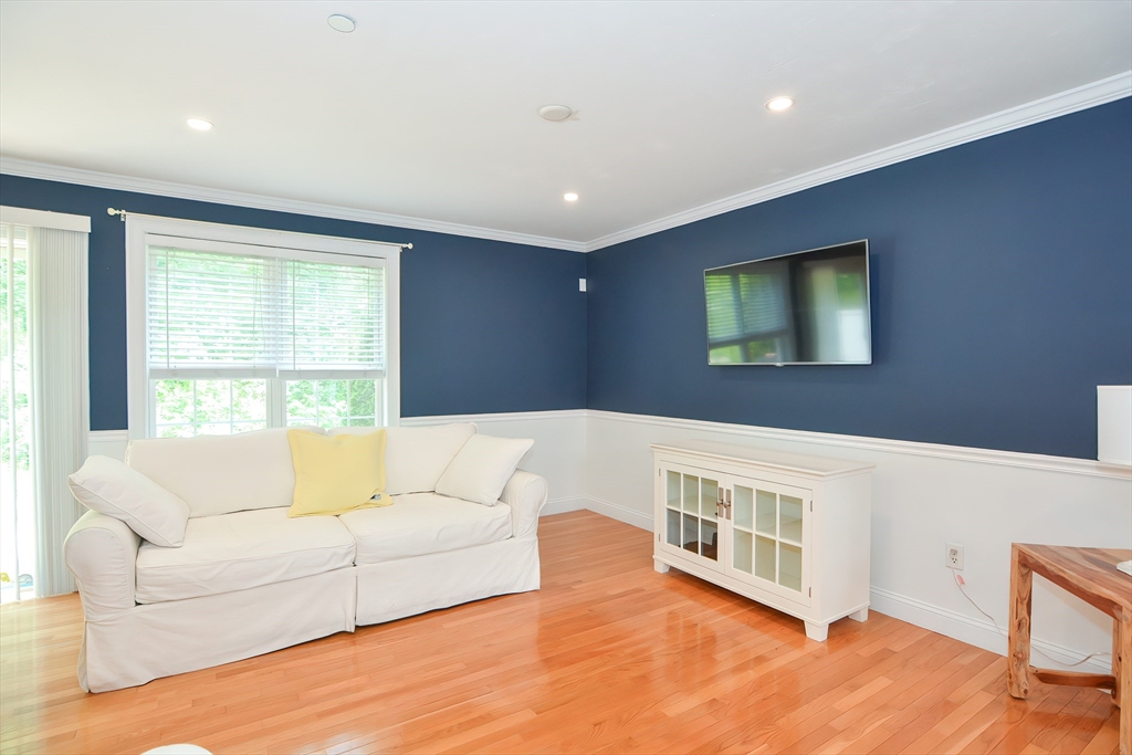 61 Providence Road, Unit 2 Grafton, MA 01519 - Photo 10 of 35 a living room with furniture and windows