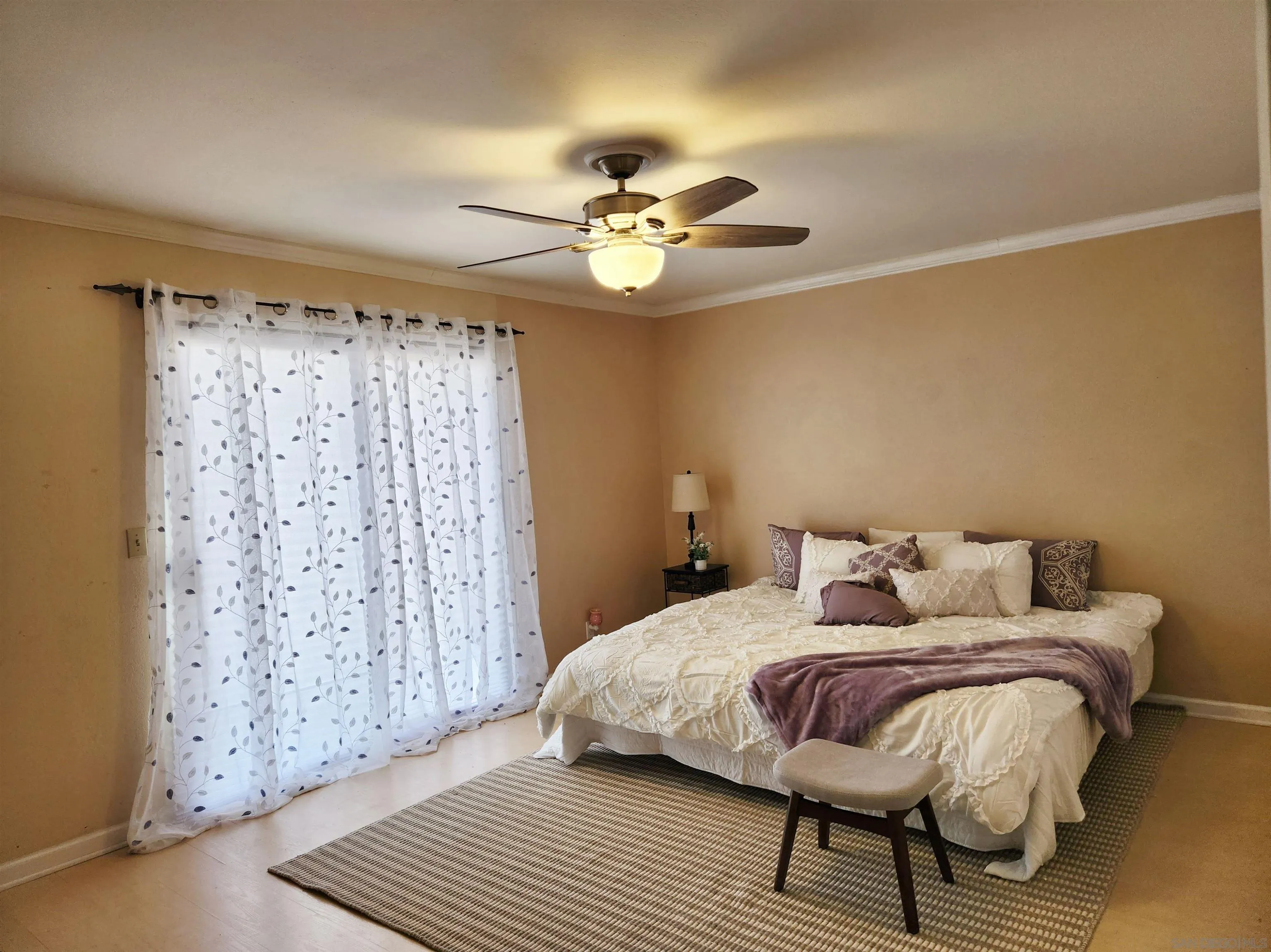 3628 Alene Avenue Ridgecrest, CA 93555 - Photo 26 of 46 a bedroom with a bed dresser and a window
