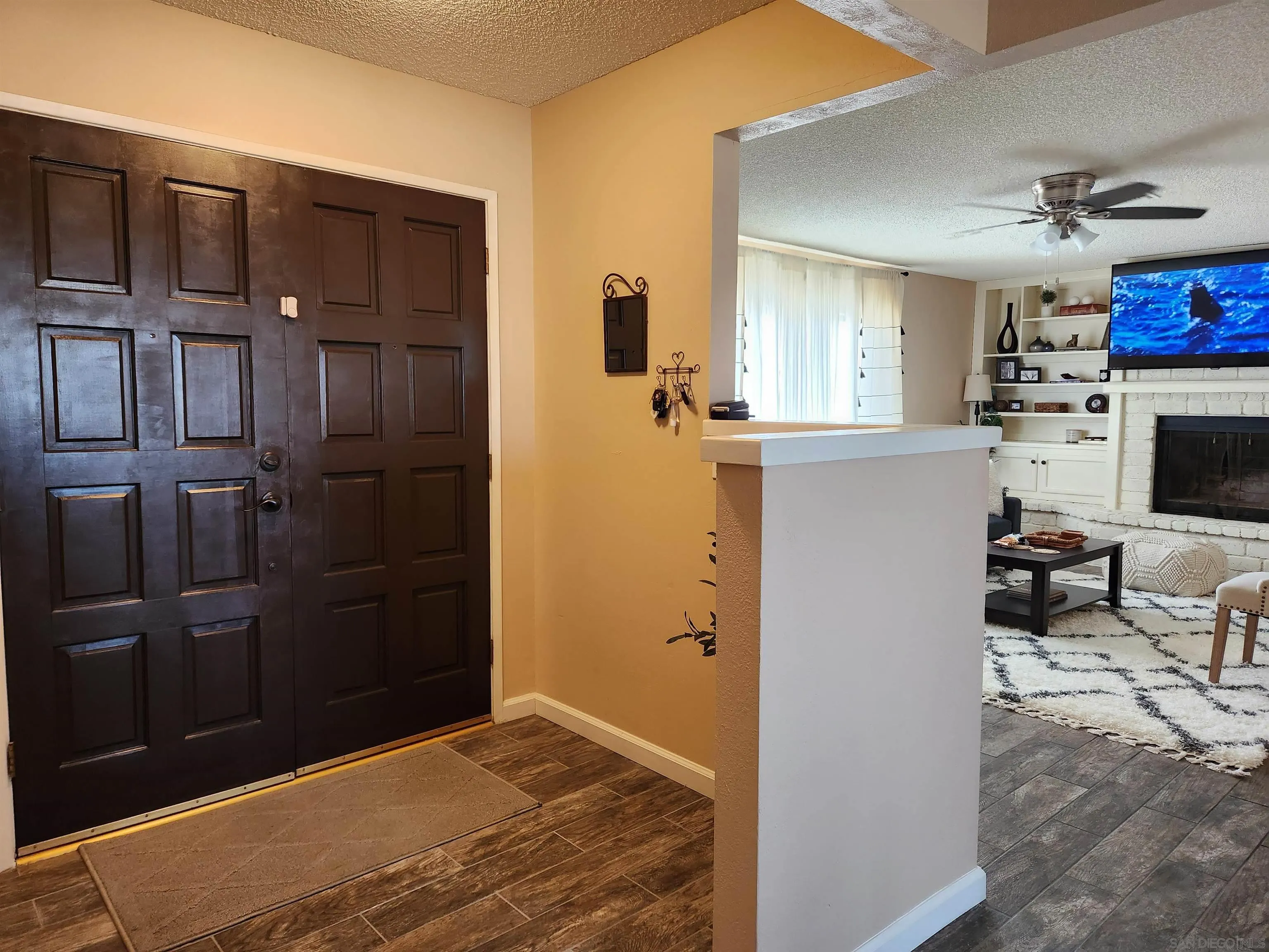 3628 Alene Avenue Ridgecrest, CA 93555 - Photo 3 of 46 a bedroom with a bed and a television