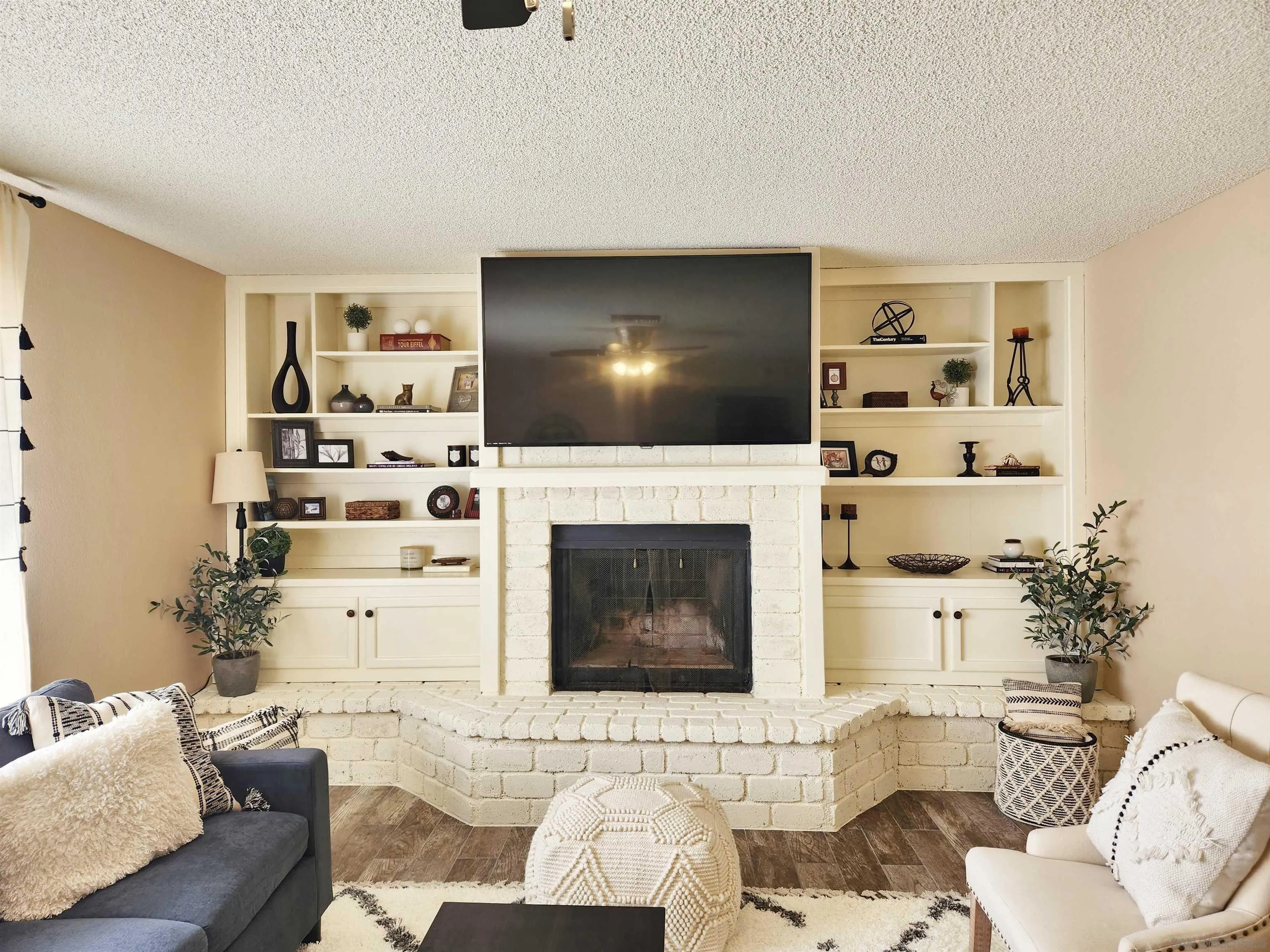 3628 Alene Avenue Ridgecrest, CA 93555 - Photo 6 of 46 a living room with furniture and a fireplace