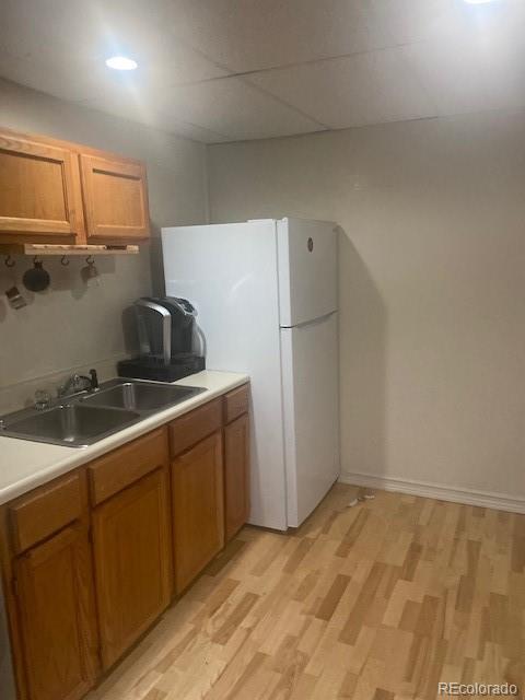 6778 Zenobia Loop, Unit 2 Westminster, CO 80030 - Photo 13 of 13 a kitchen with a sink cabinets and appliances