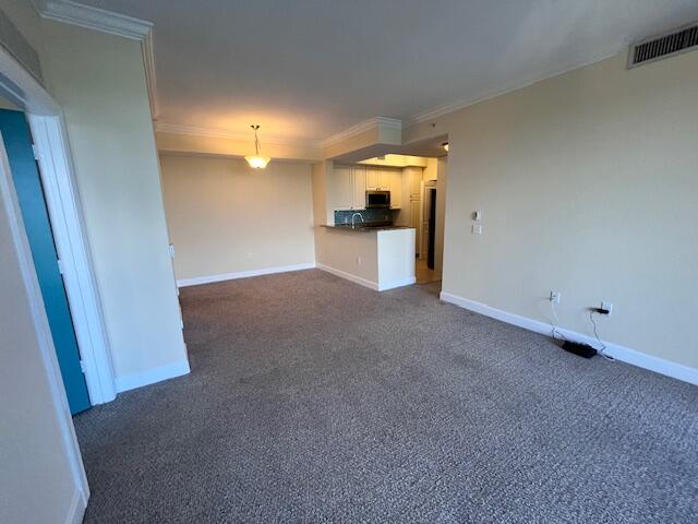 1660 Renaissance Commons Boulevard, Unit 2608 Boynton Beach, FL 33426 - Photo 13 of 31 a view of a hallway to a room