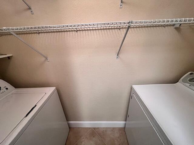 1660 Renaissance Commons Boulevard, Unit 2608 Boynton Beach, FL 33426 - Photo 14 of 31 a utility room with dryer and washer