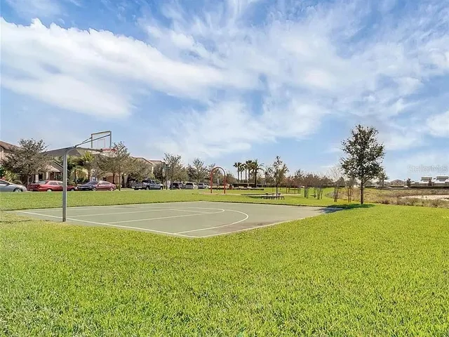 a view of an ocean house and swimming pool