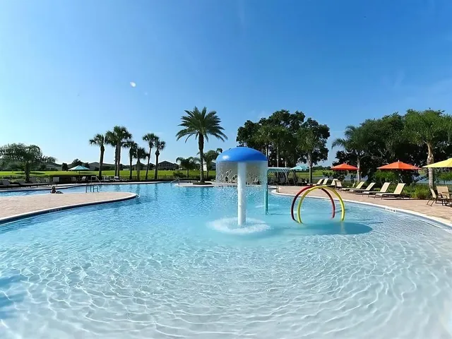 a view of a park with swings