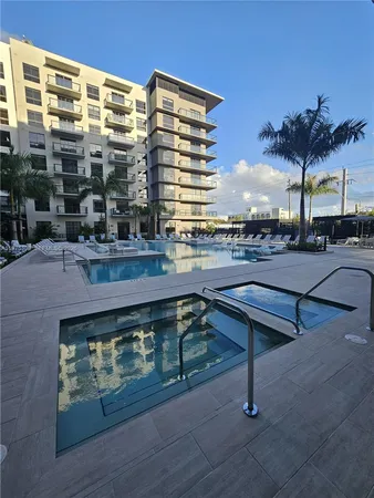 a view of building with outdoor space and seating area