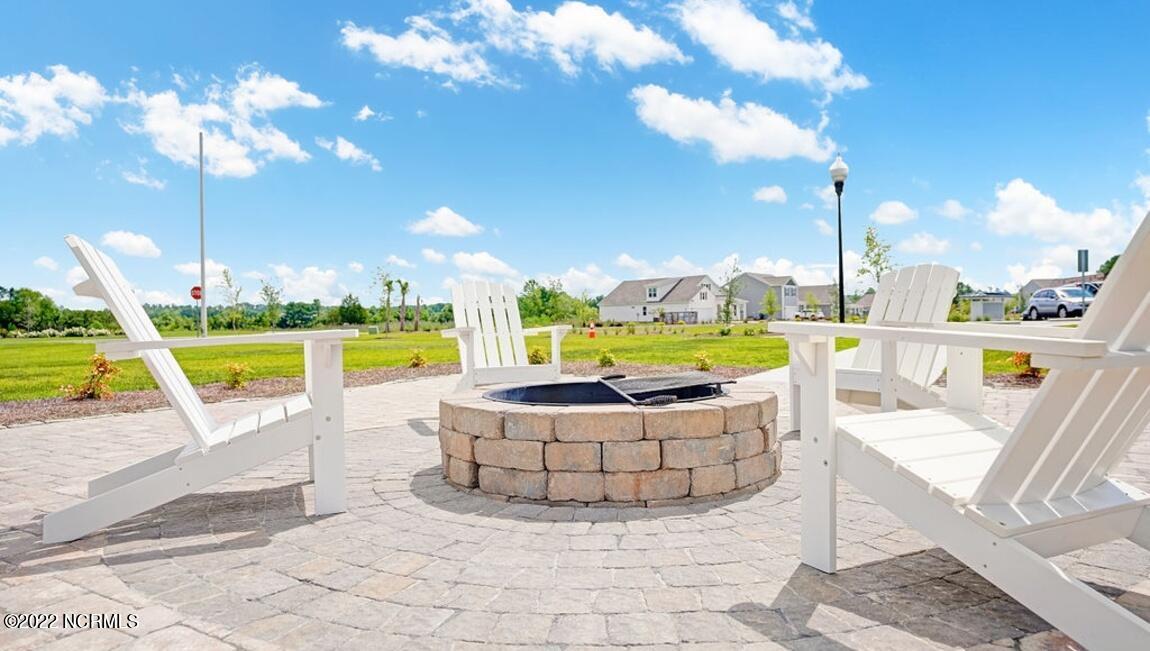 1128 Burled Oak Rdg Loop Southeast, Unit LOT 35 Bolivia, NC 28422 - Photo 24 of 27 Fire Pit