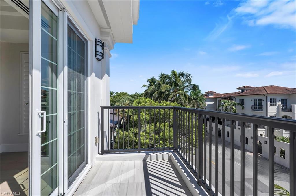 490 5th Street South, Unit 101 Naples, FL 34102 - Photo 26 of 50 a view of a balcony with city view
