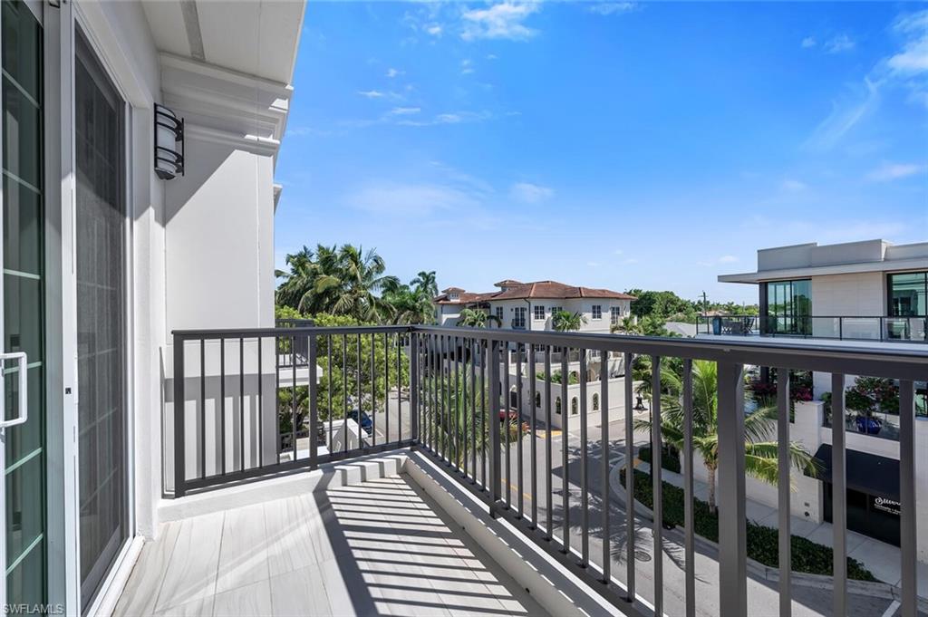 490 5th Street South, Unit 101 Naples, FL 34102 - Photo 27 of 50 a view of a balcony with city view