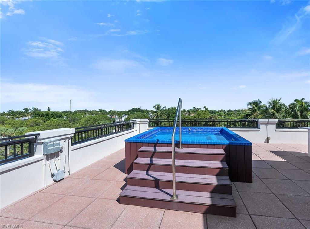 490 5th Street South, Unit 101 Naples, FL 34102 - Photo 45 of 50 a view of outdoor space with seating