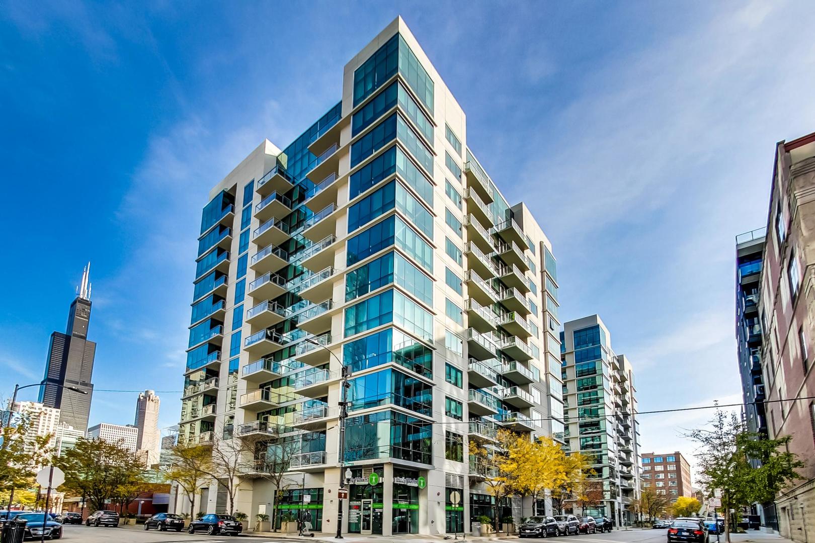 123 South Green Street, Unit 701B Chicago, IL 60607 - Photo 1 of 25 a front view of a building