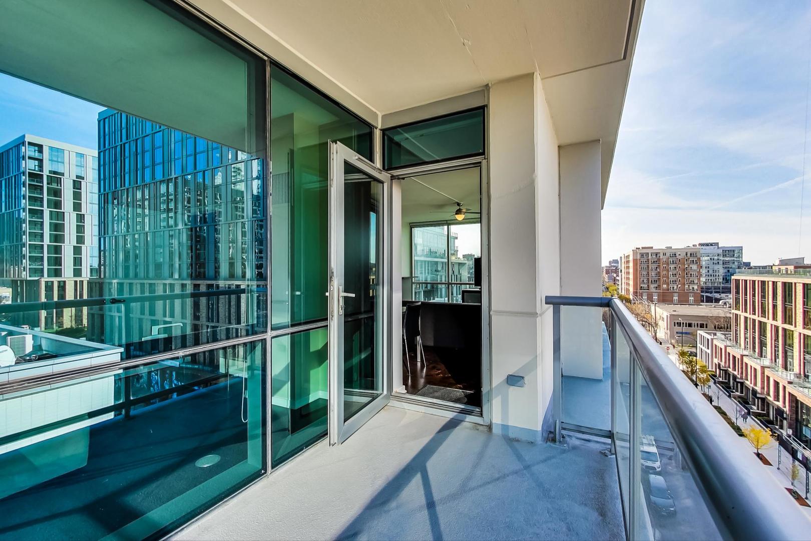123 South Green Street, Unit 701B Chicago, IL 60607 - Photo 16 of 25 a balcony with view of swimming pool