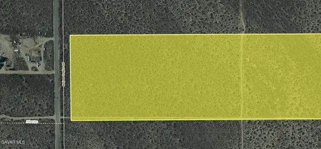 a view of a swimming pool with an outdoor space and seating area