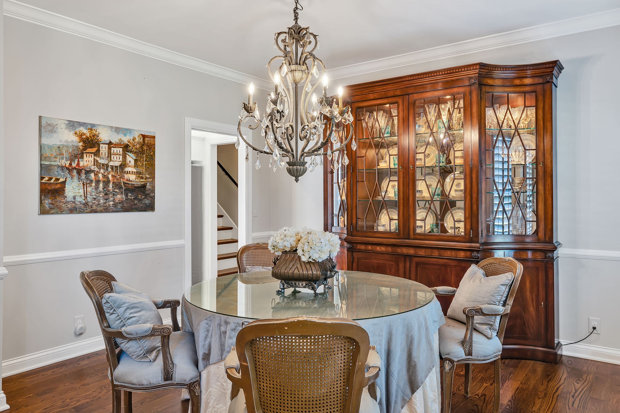 2829 Polo Club Road Nashville, TN 37221 - Photo 15 of 45 a dining room with furniture a chandelier and wooden floor