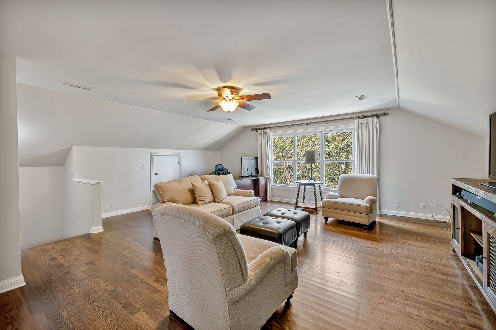 2829 Polo Club Road Nashville, TN 37221 - Photo 17 of 45 a living room with furniture and a window