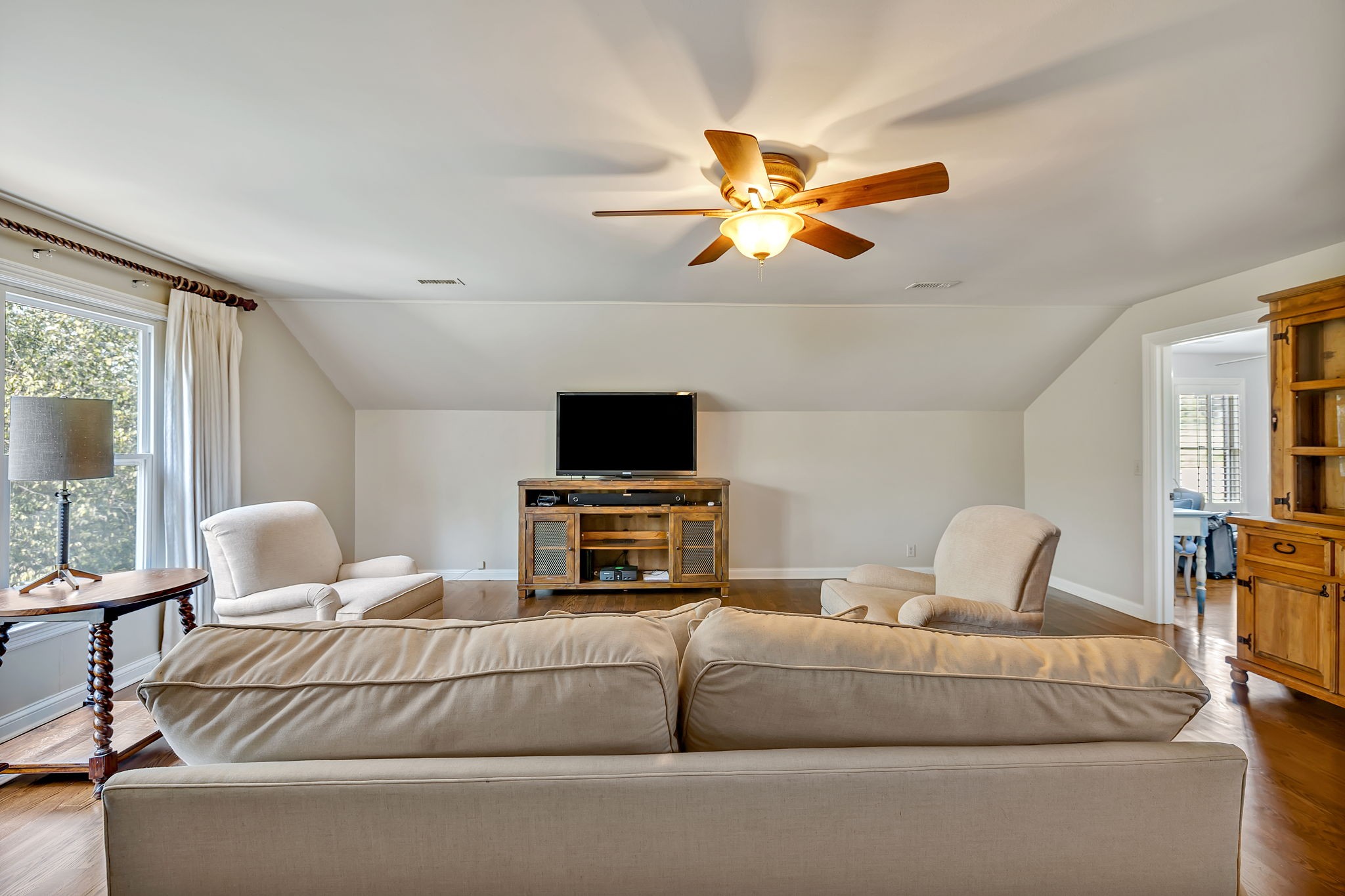 2829 Polo Club Road Nashville, TN 37221 - Photo 19 of 45 a living room with furniture and a flat screen tv