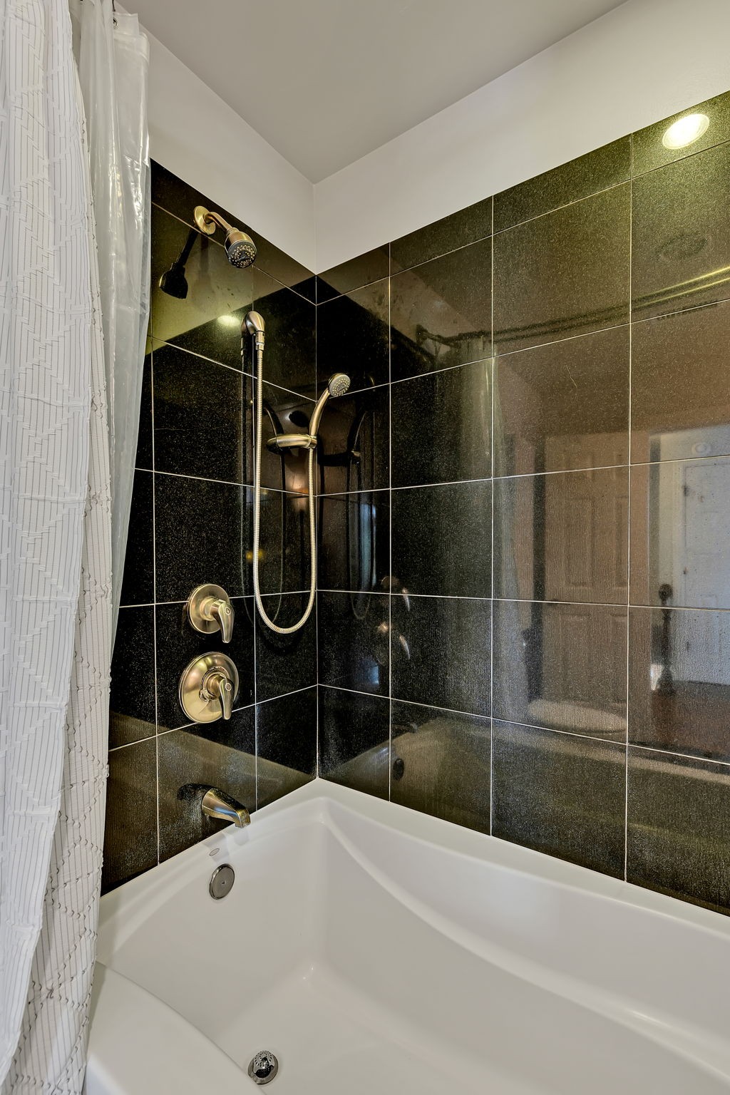 2829 Polo Club Road Nashville, TN 37221 - Photo 24 of 45 a bathroom with a bathtub and a shower