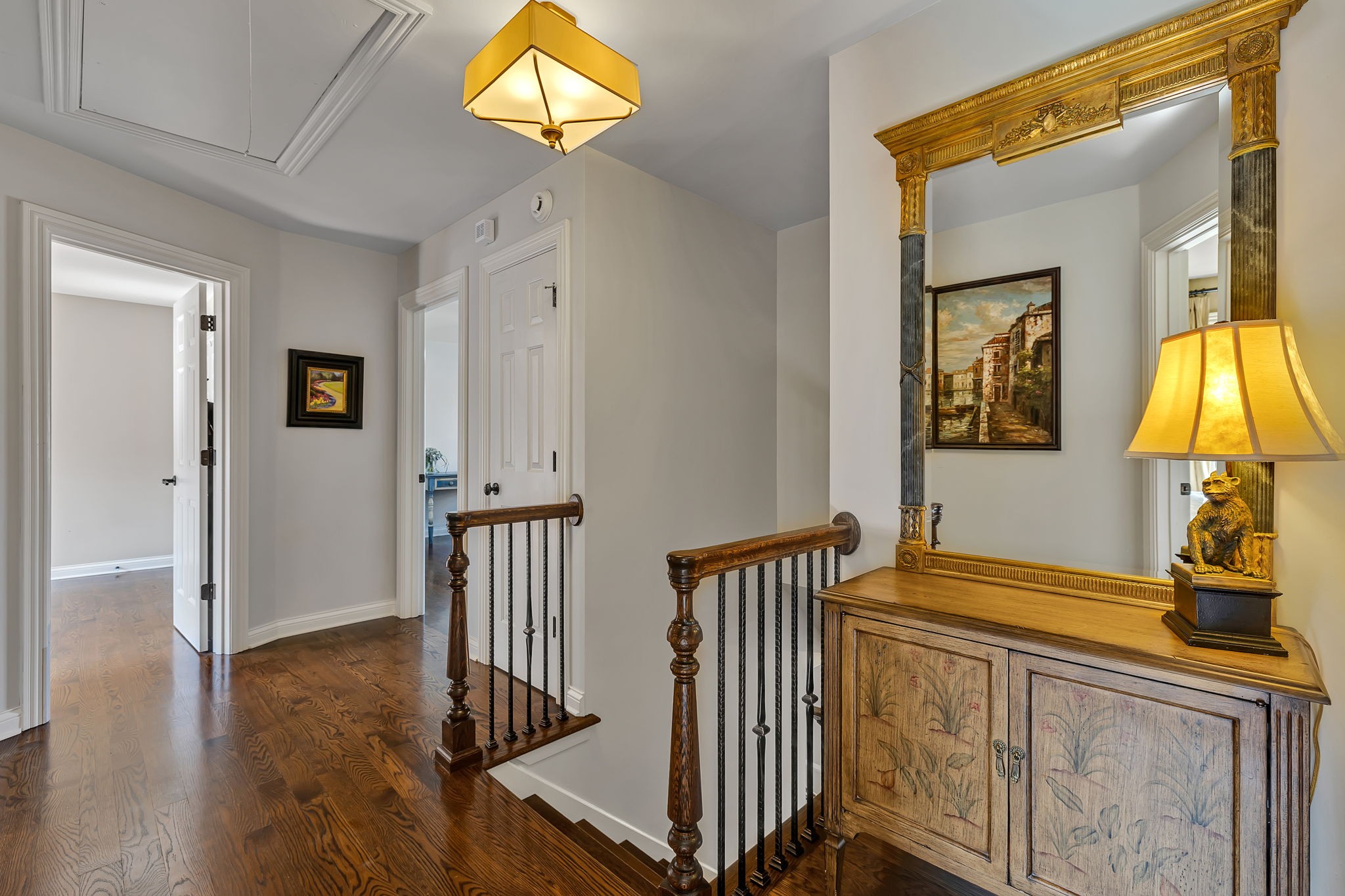 2829 Polo Club Road Nashville, TN 37221 - Photo 25 of 45 a view of a hallway with wooden floor and a mirror