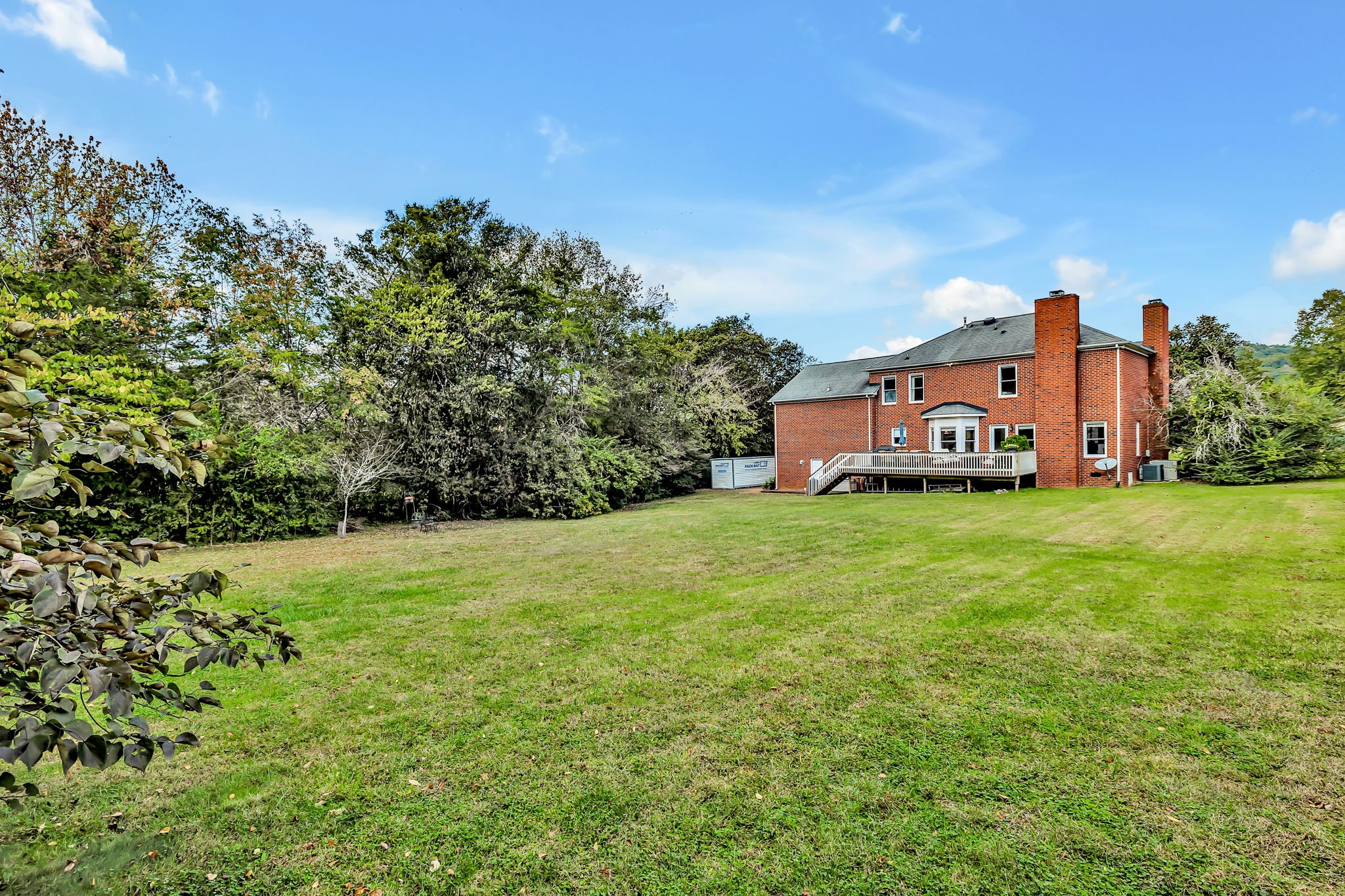 2829 Polo Club Road Nashville, TN 37221 - Photo 37 of 45 a view of a house with a big yard