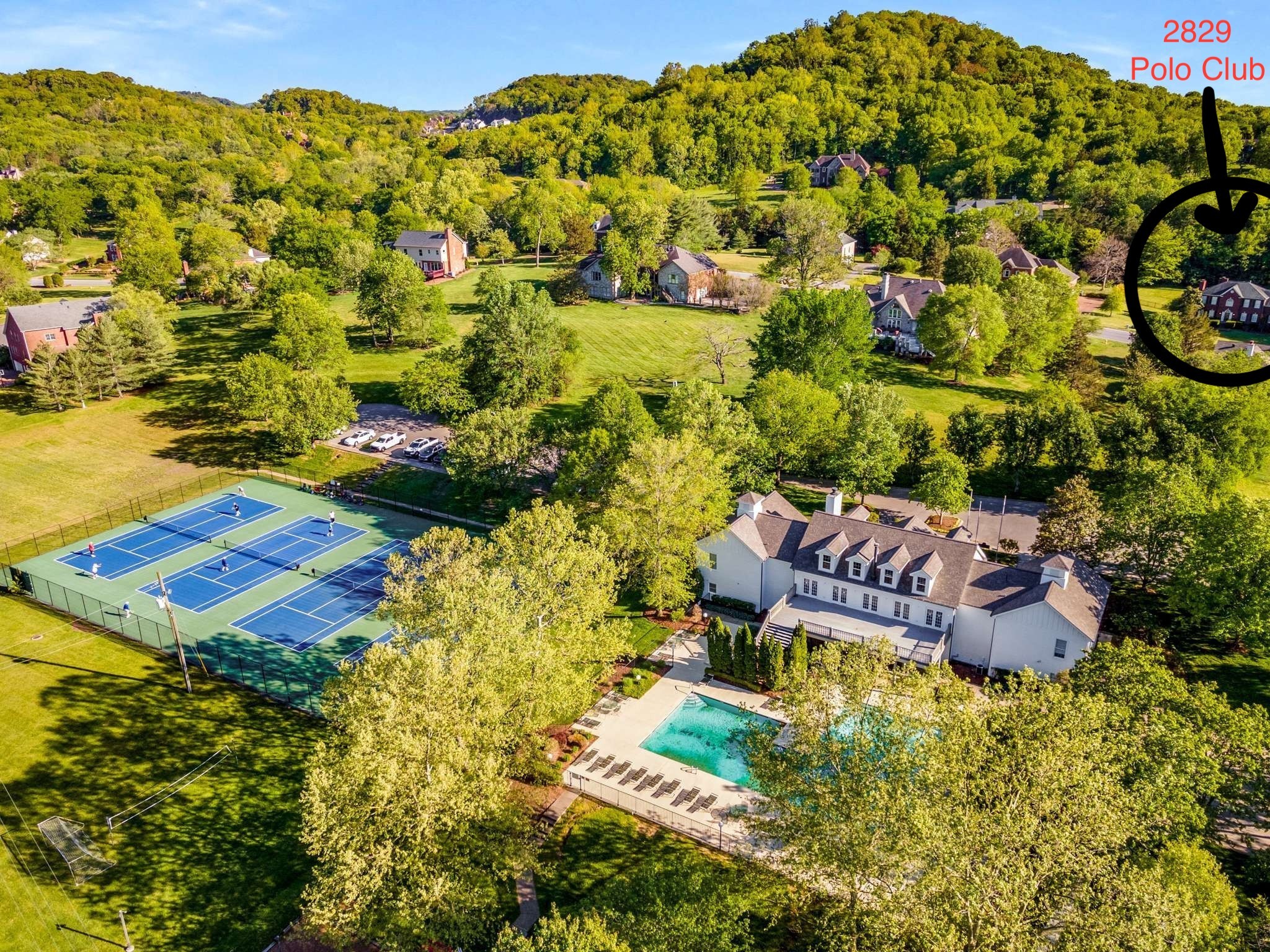 2829 Polo Club Road Nashville, TN 37221 - Photo 40 of 45 a view of a backyard with plants and a garden