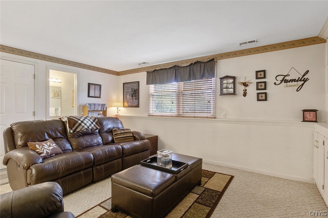 8185 Rizzo Drive Clay, NY 13041 - Photo 13 of 28 The family room that is downstairs in the lower le