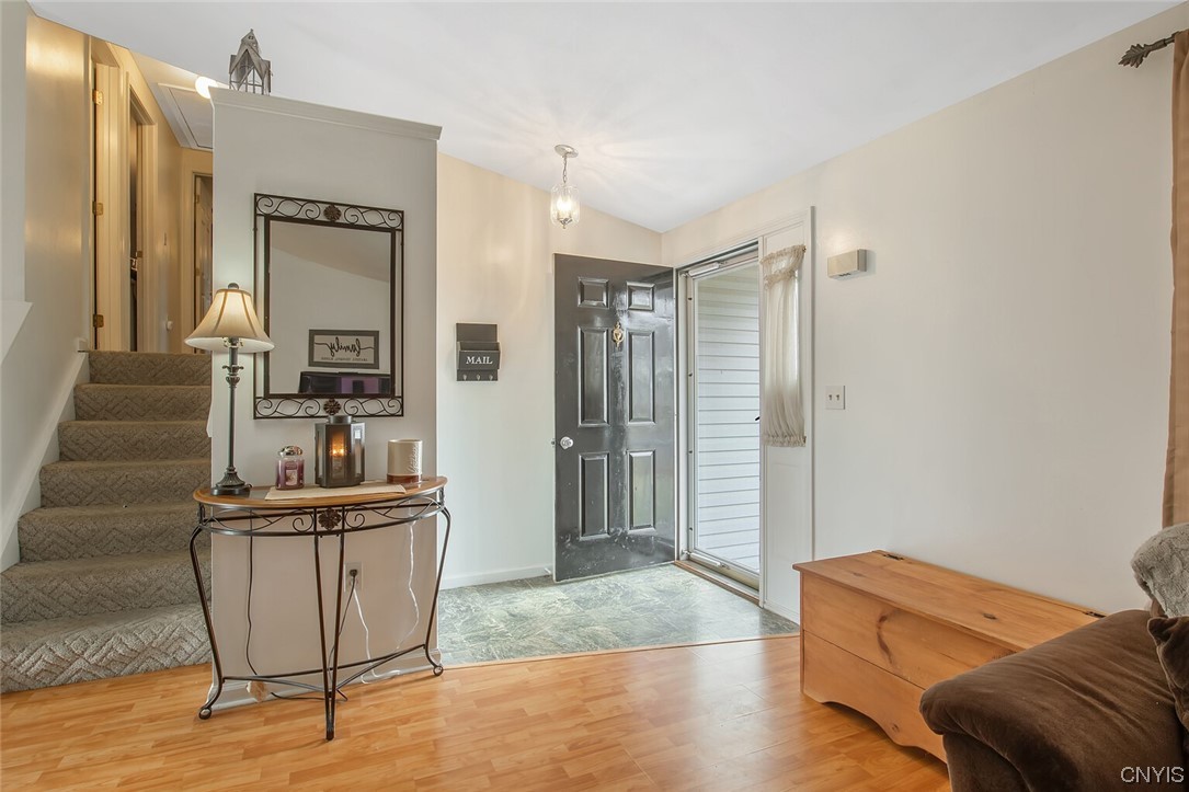 8185 Rizzo Drive Clay, NY 13041 - Photo 4 of 28 Front door to the right, upstairs to the bedrooms