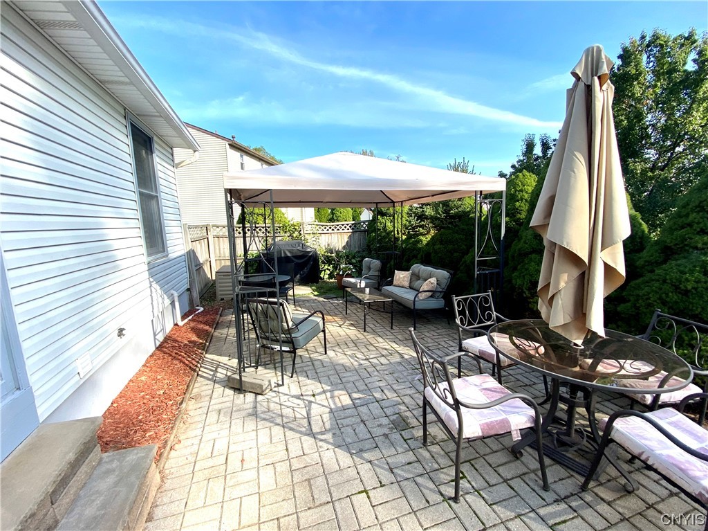 8185 Rizzo Drive Clay, NY 13041 - Photo 9 of 28 Back patio off of kitchen