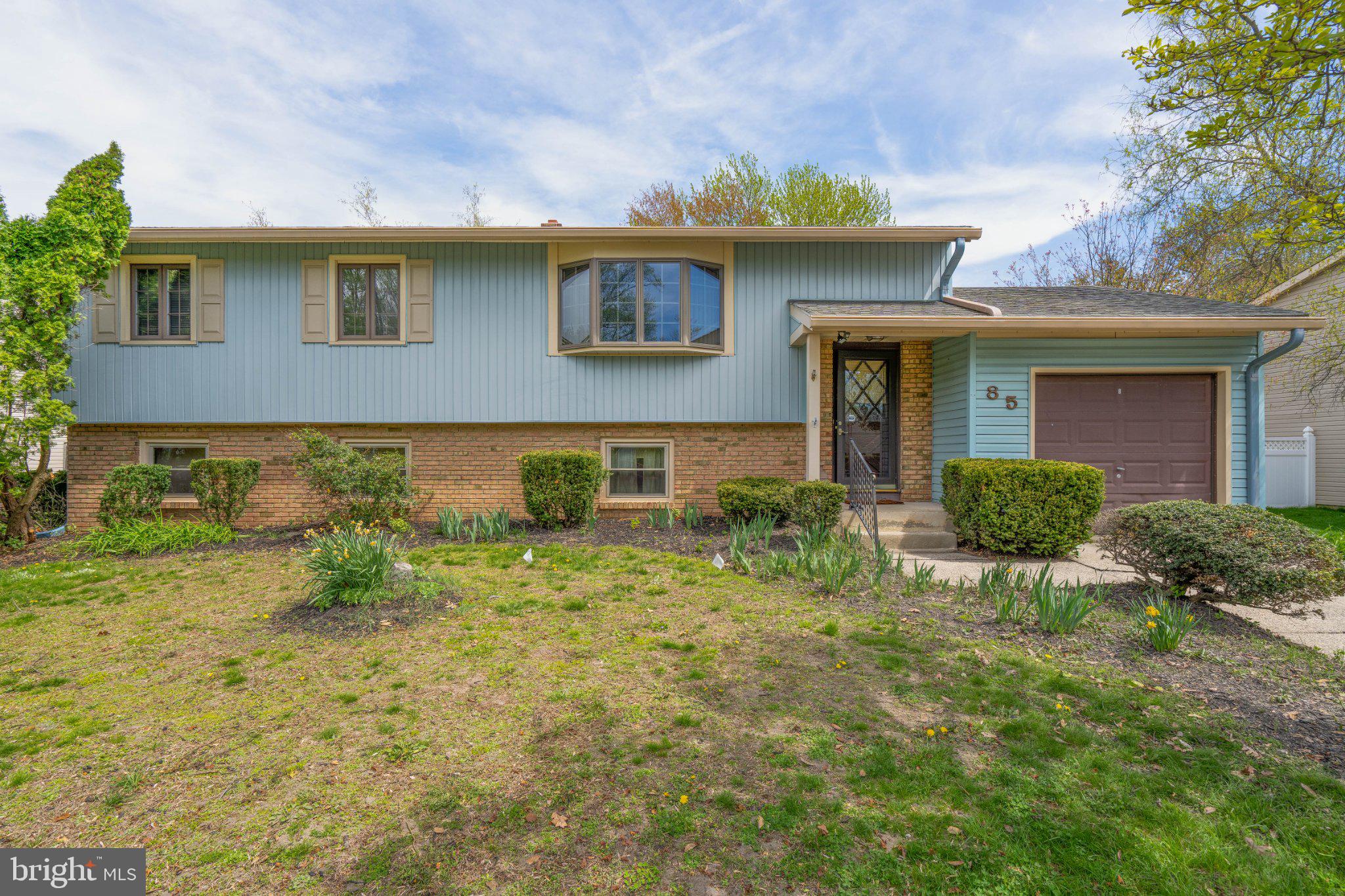85 Golfview Drive Sewell, NJ 08080 - Photo 1 of 1 Charming split-level home with greenery.