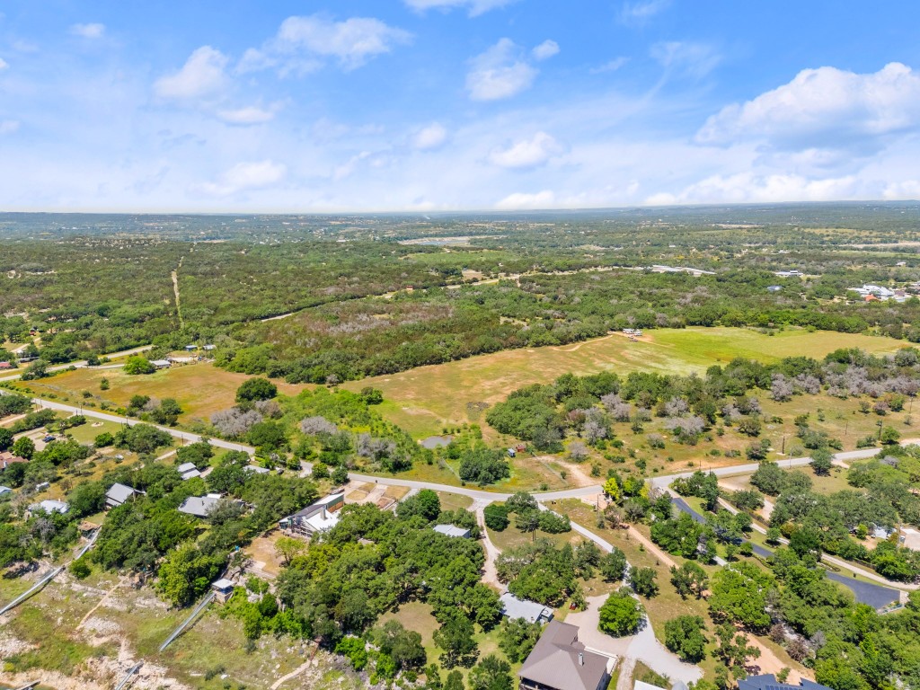 525 Pace Bend Road North Spicewood, TX 78669 - Photo 19 of 28 a view of an ocean and beach