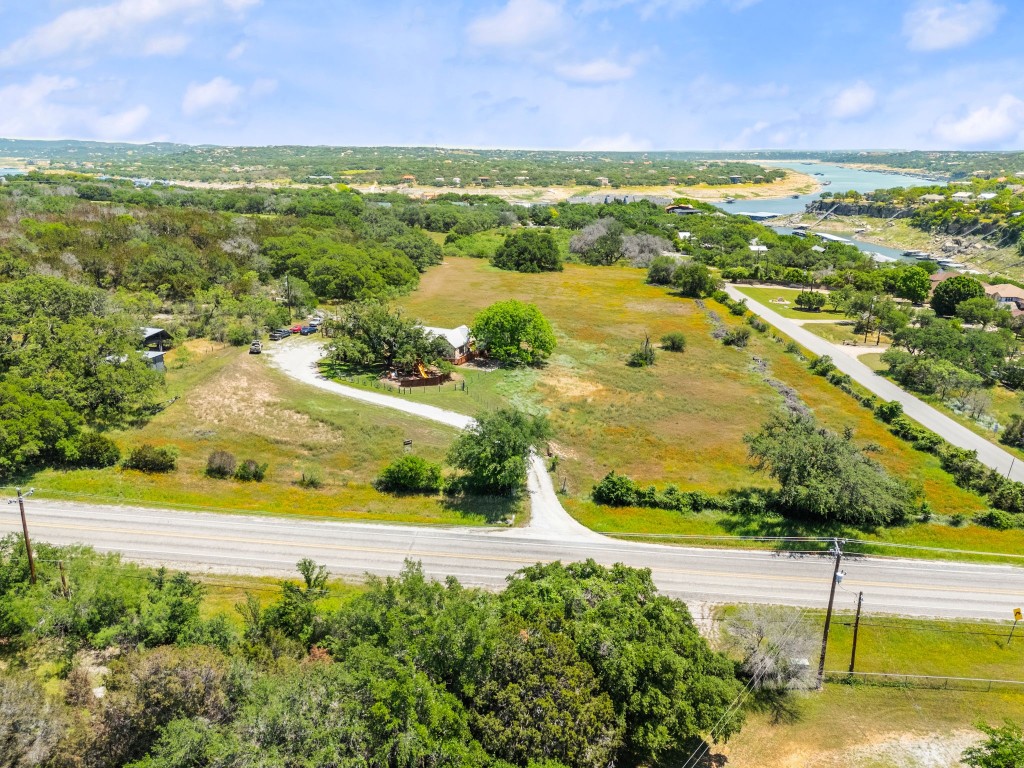 525 Pace Bend Road North Spicewood, TX 78669 - Photo 23 of 28 a view of an outdoor space and a lake view
