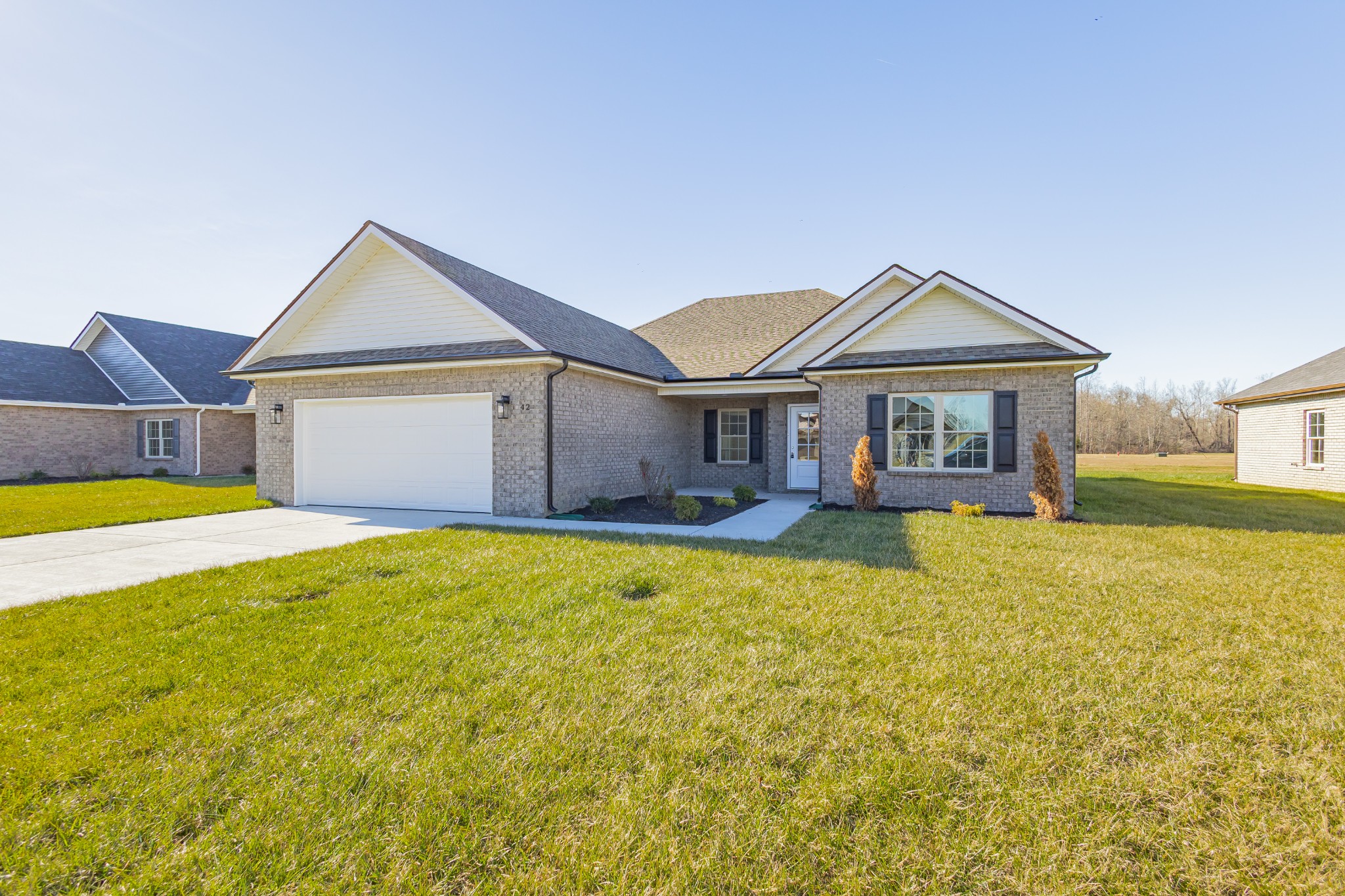 a front view of a house with swimming pool