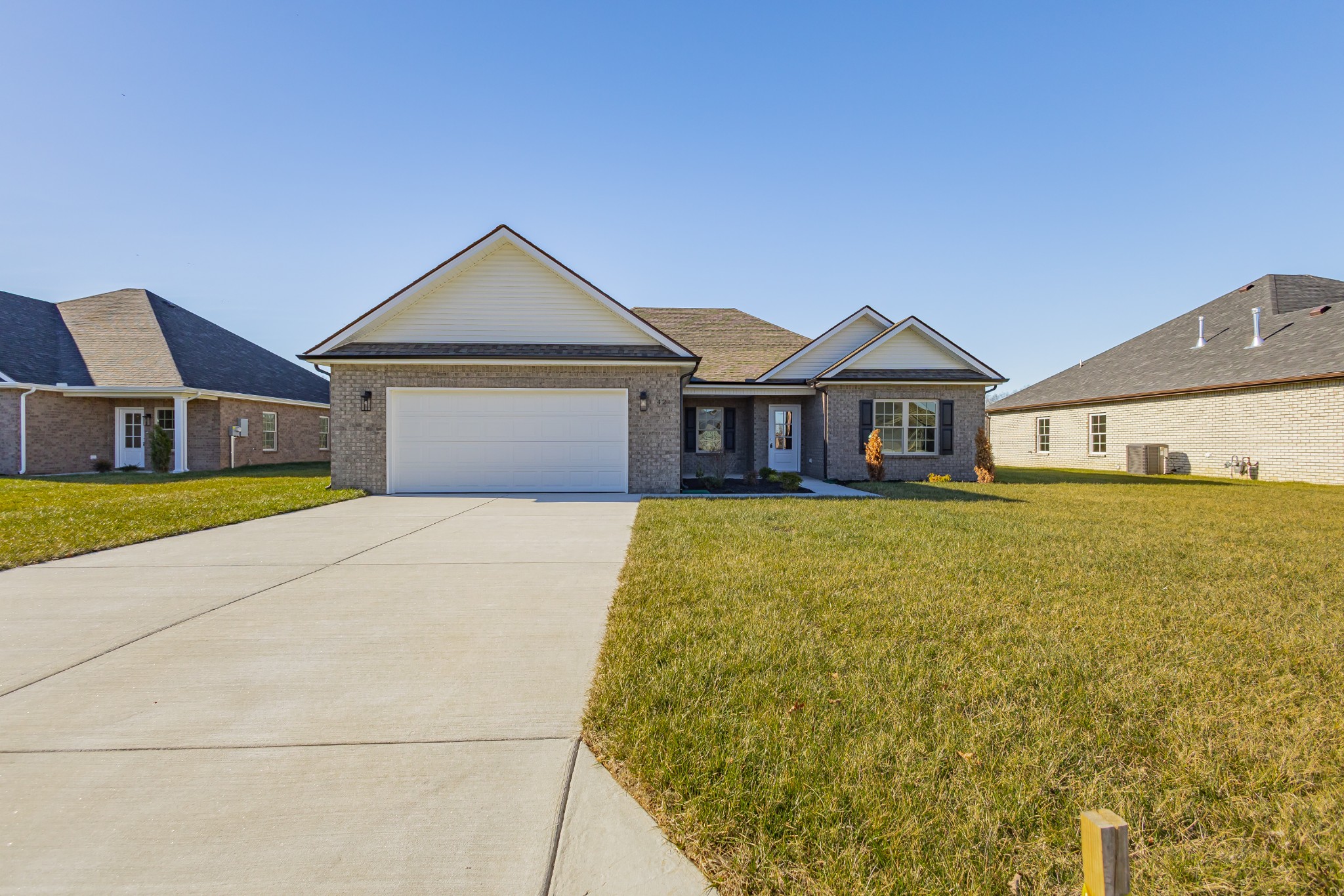 42 Brooklyn Avenue Manchester, TN 37355 - Photo 2 of 64 a front view of a house with yard