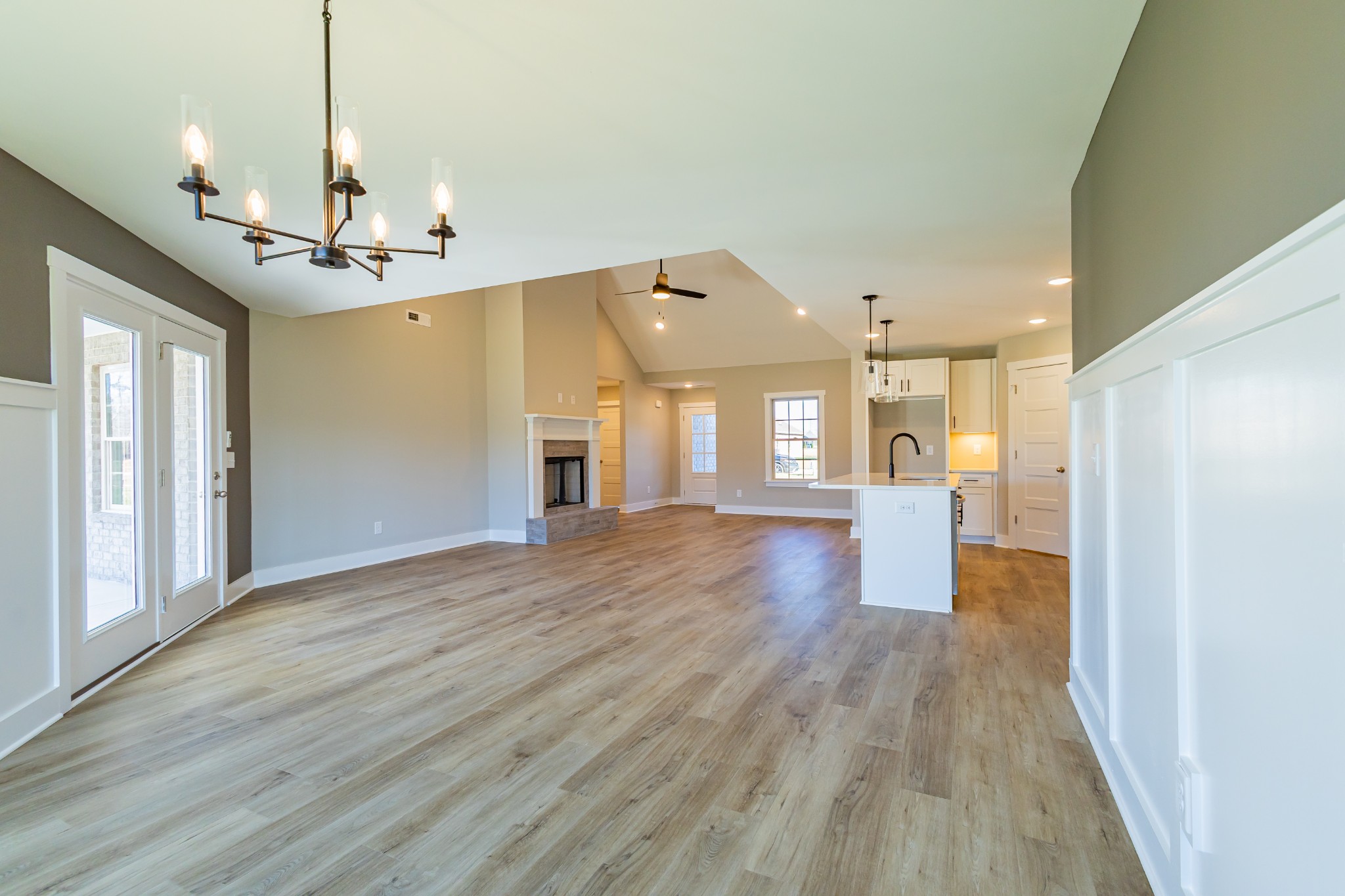 42 Brooklyn Avenue Manchester, TN 37355 - Photo 30 of 64 a view of a hallway with wooden floor and a kitchen