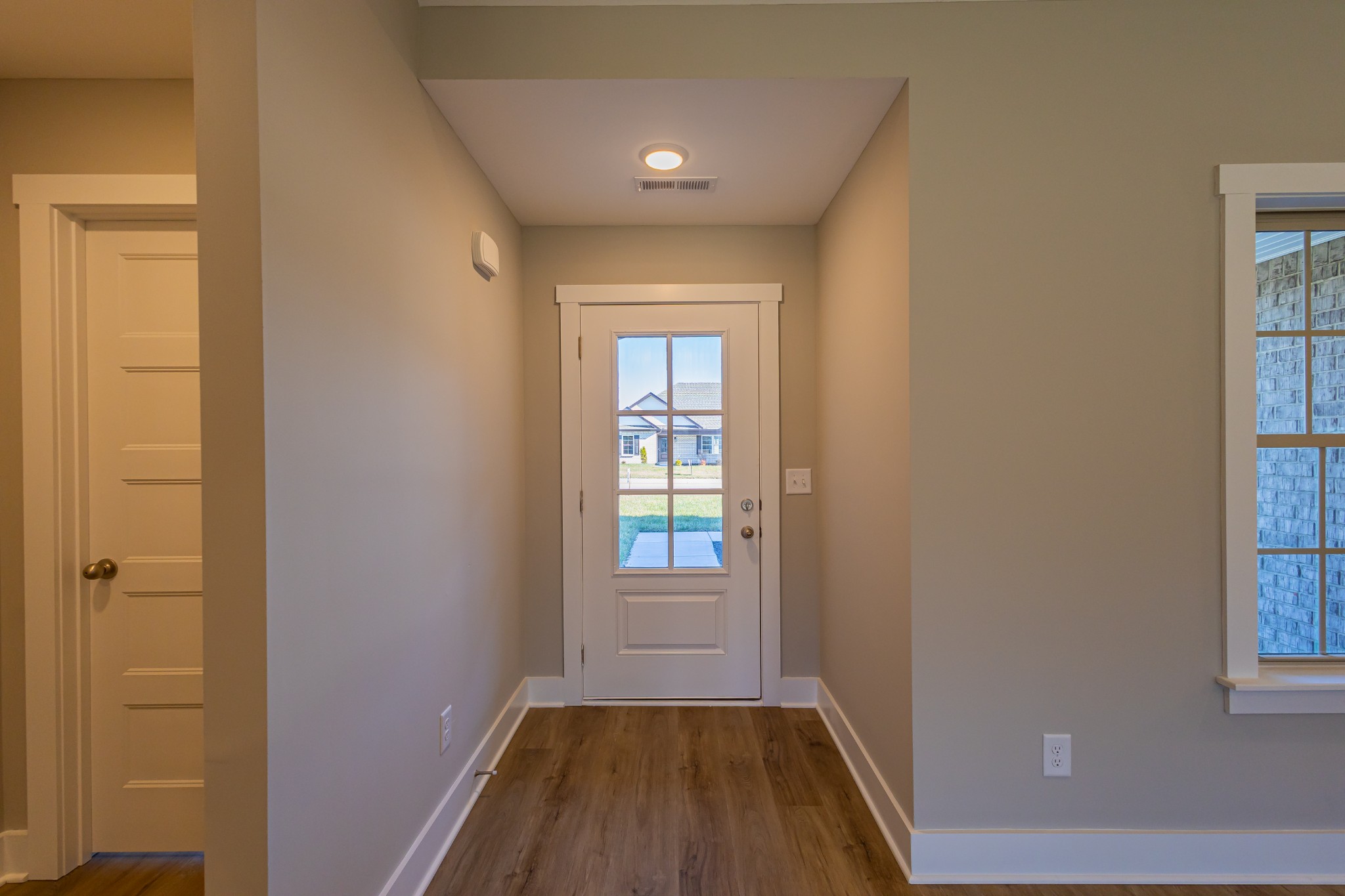 42 Brooklyn Avenue Manchester, TN 37355 - Photo 32 of 64 a view of a room with wooden floor and windows