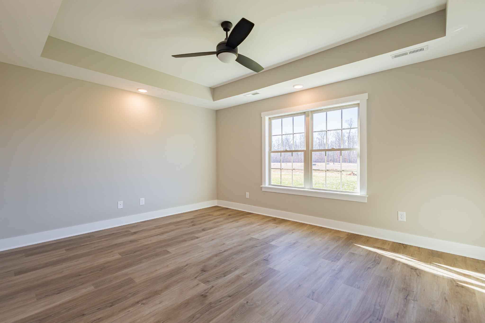 42 Brooklyn Avenue Manchester, TN 37355 - Photo 33 of 64 wooden floor in an empty room with a window