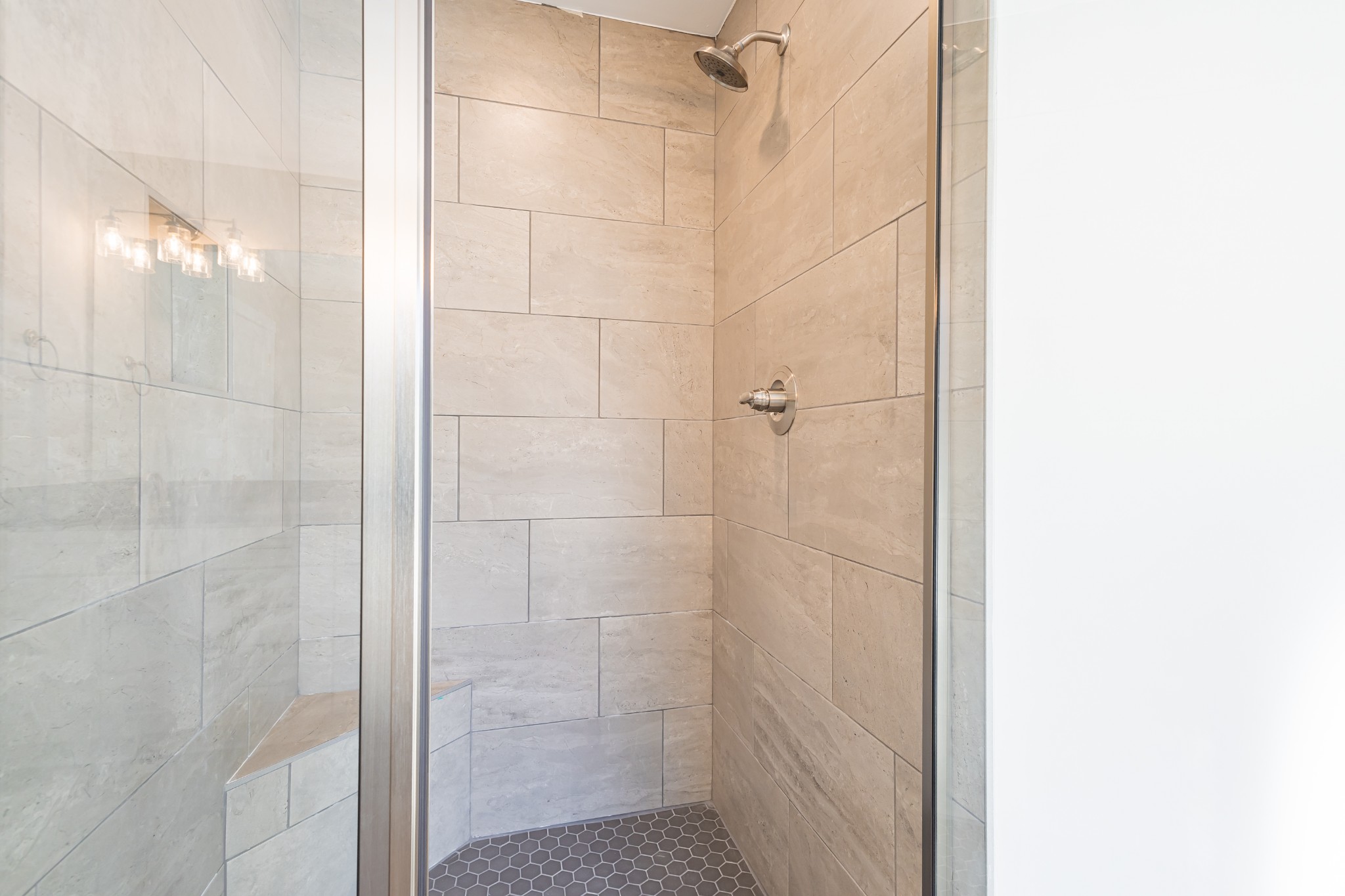 42 Brooklyn Avenue Manchester, TN 37355 - Photo 41 of 64 a bathroom with a glass shower door