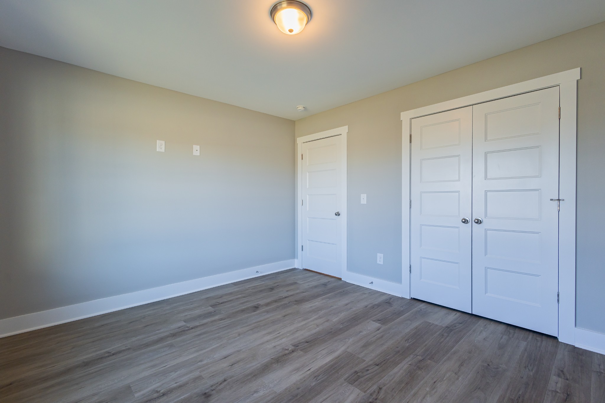 42 Brooklyn Avenue Manchester, TN 37355 - Photo 50 of 64 a view of an empty room with wooden floor