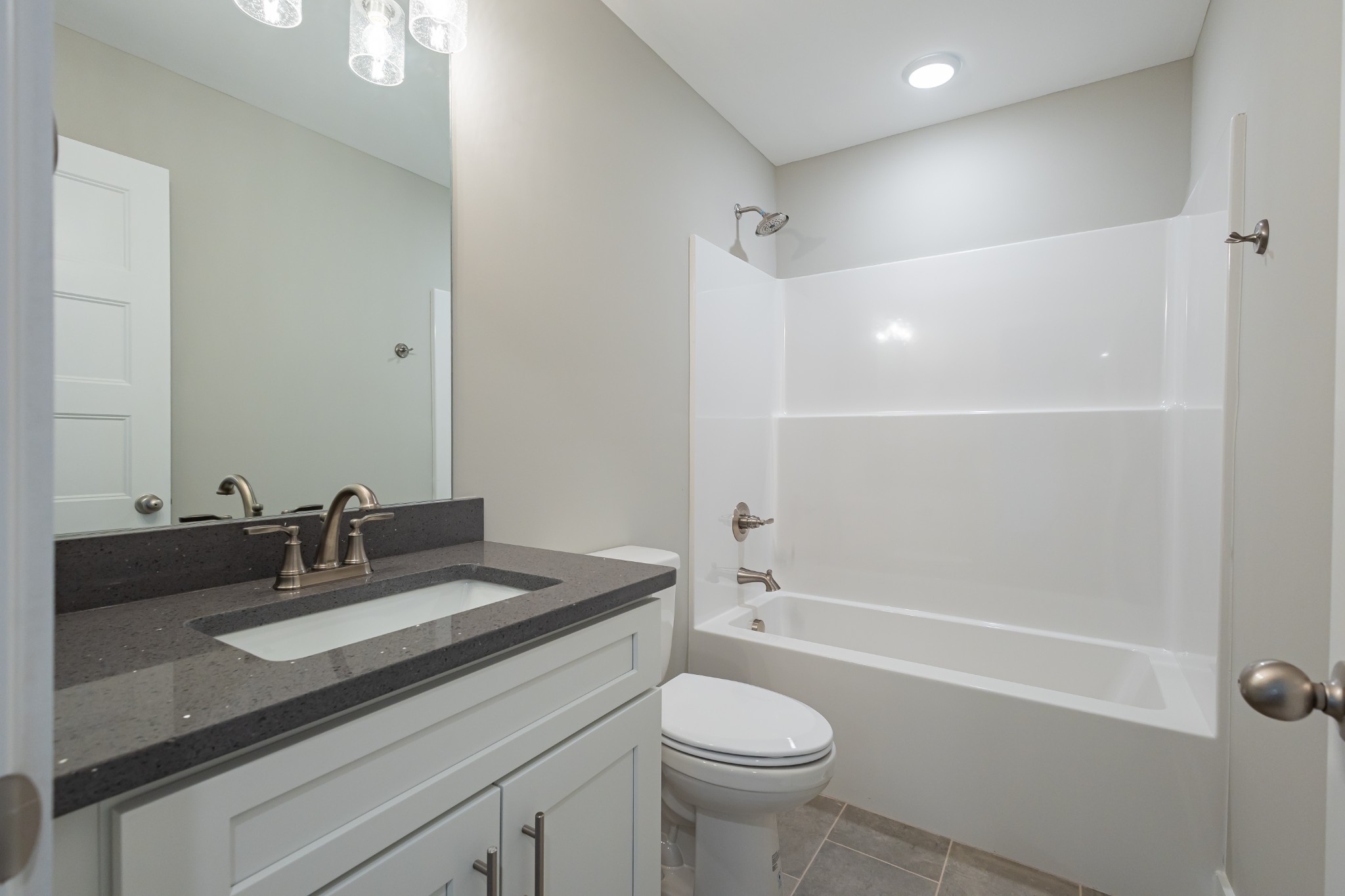 42 Brooklyn Avenue Manchester, TN 37355 - Photo 58 of 64 a bathroom with a sink a toilet and shower