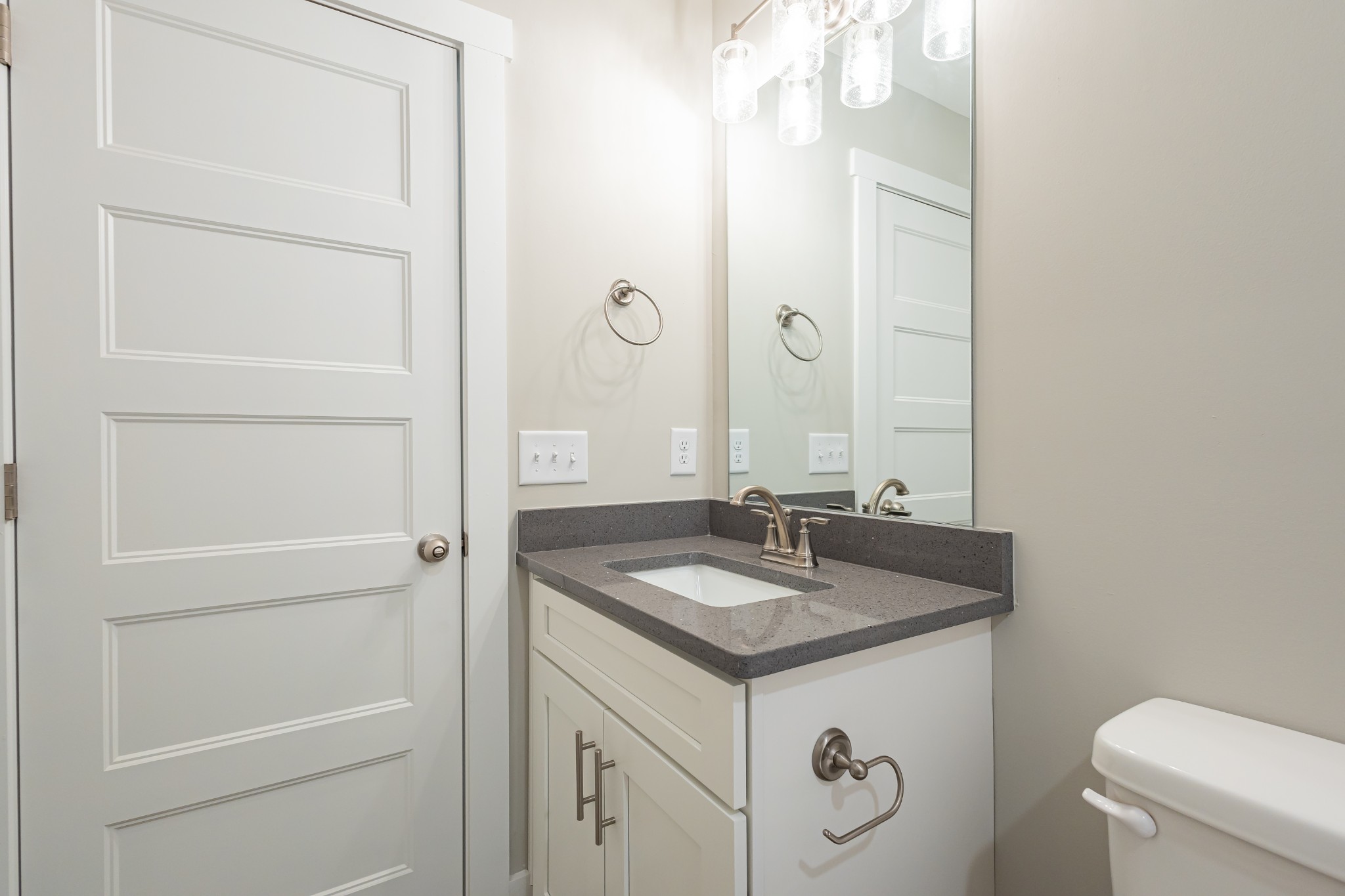 42 Brooklyn Avenue Manchester, TN 37355 - Photo 59 of 64 a bathroom with a granite countertop sink and a mirror