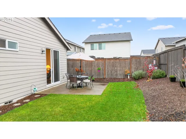 a outdoor living space with furniture and garden