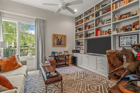 a room with furniture workspace and a window