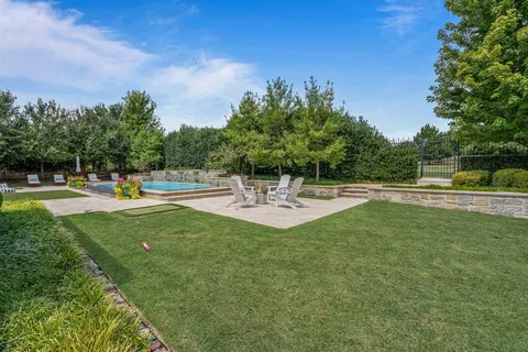 a view of a park with swings and slides