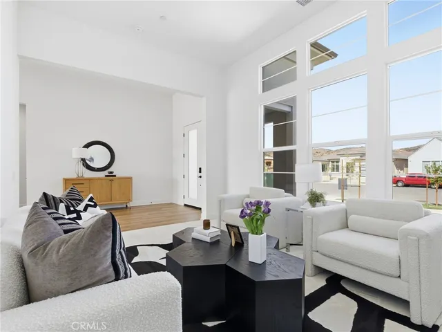 a living room with furniture and window