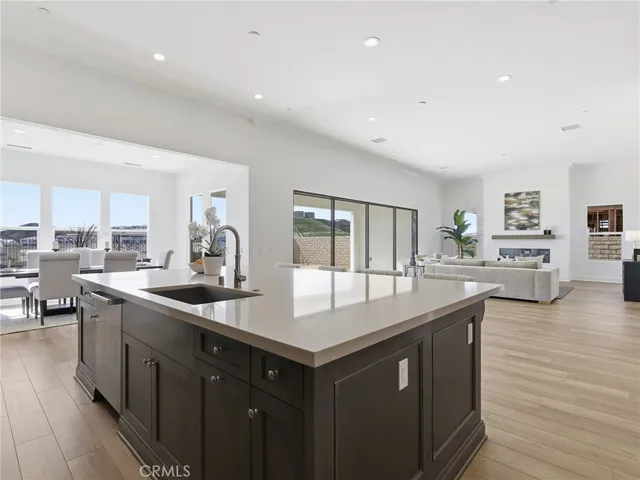 a kitchen with sink and cabinets