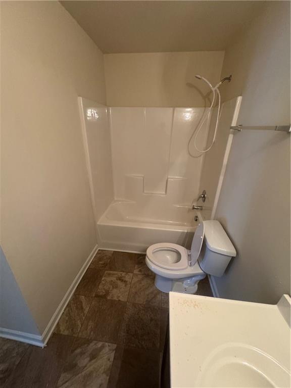 1579 Leonard Street Hampton, GA 30228 - Photo 25 of 25 a bathroom with a sink and toilet