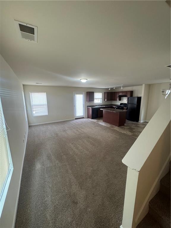1579 Leonard Street Hampton, GA 30228 - Photo 8 of 25 a view of a kitchen with furniture and a kitchen