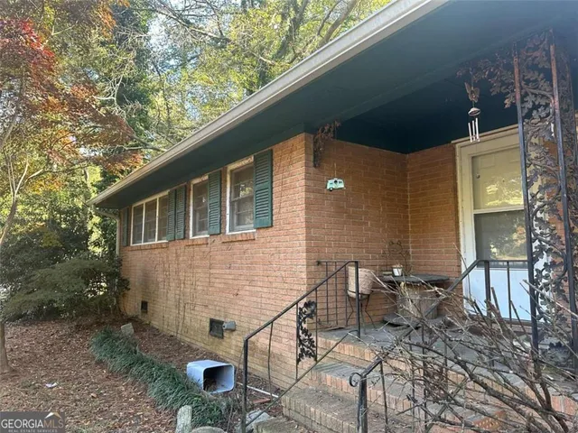 a front view of a house with patio