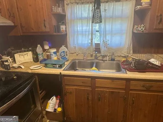 a view of a chairs and table in a room